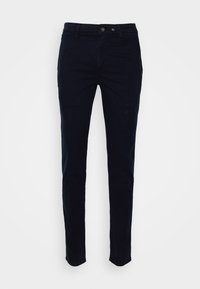 Pantalon noir coupe slim avec fermeture bouton et zip devant, passants de ceinture et poches avant sur fond blanc uni.
