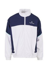 Fehér és tengerészszínű szélálló dzseki magas gallérral, teljes hosszúságú cipzárral, rugalmas mandzsettával és oldalsó zsebekkel. A mellkason a gyártó logójával.