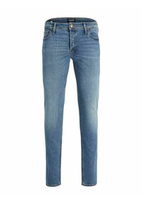 Bleka blå denimjeans med smal passform, fem fickor och en enda framknapp. Har subtila slitningar och lätt slitage på låren.