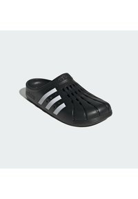 Sandal nero slip-on con design a intagli, tre strisce bianche sul lato, superficie testurizzata e suola curvata per il comfort.