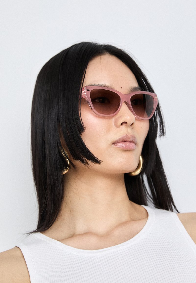COACH Sunglasses - milky pink / transparent pink/pink  display picture 1