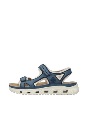 Blue synthetic sandal with a white textured sole, featuring adjustable straps and cut-out design. Includes a logo on the side and cushioning.