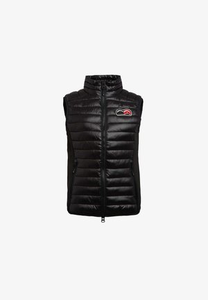 Gilet en duvet noir avec un design matelassé, col haut et zip à l'avant. Comprend des poches latérales et un logo sur la poitrine. Texture douce.