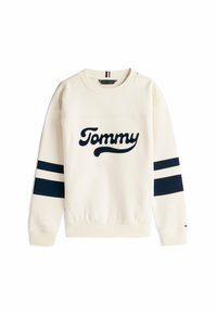 Crème kleurige sweatshirt met een marineblauw "Tommy" logo, voorzien van twee marineblauwe strepen op de mouwen, geribbelde manchetten en tailleband.