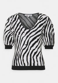 Jersey de rayas de cebra tejido en blanco y negro, con cuello en V, mangas cortas abullonadas y un dobladillo negro sólido.