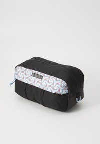 Black fabric toiletry bag with a geometric patterned light blue top, featuring a zipper, light blue drawstring, and a logo patch.