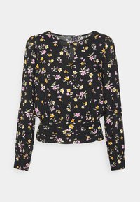 Svart långärmad blus med blommönster i rosa, gult och grönt; samlad midja och liten nyckelhålsdetalj vid halsen.