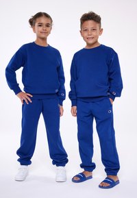 Champion EXCLUSIVE PANT UNISEX - Treniņtērpa apakšdaļas - dark blue