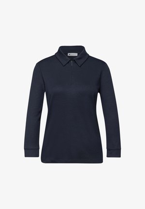 Laivastonsininen pitkähihaisen polopaita vetoketjullisella kauluksella, pehmeästä materiaalista valmistettu, sileäpintainen ja vartalonmyötäinen malli.