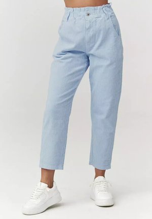 - Spodnie materiałowe