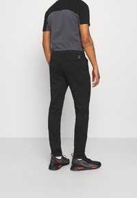 Replay Pantaloni - black