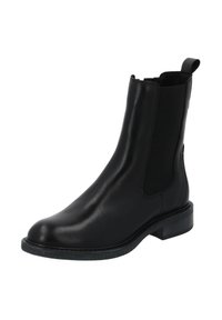 Czarne skórzane botki Chelsea z elastycznymi panelami bocznymi, zaokrąglonym noskiem, płaską podeszwą i pętelką z tyłu ułatwiającą zakładanie.