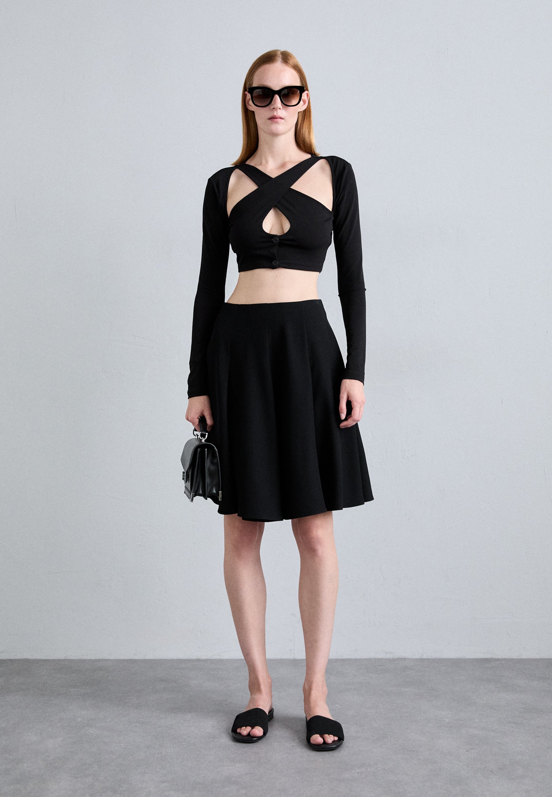 スカート EMPORIO ARMANI Woman Wrap-skirt Black EW000906AF12199 FC062 Women's Skirts: long, short, and pencil skirts | Emporio Armani