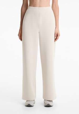 OYSHO SOFT TOUCH STRAIGHT-LEG STRIPED - Trousers - sand