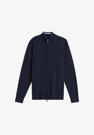 Marineblauwe cardigan met ritssluiting, voorzien van een geribde kraag en boordjes, gemaakt van gestructureerde gebreide stof. Heeft een subtiel logo op de borst en een ritssluiting over de volledige lengte.