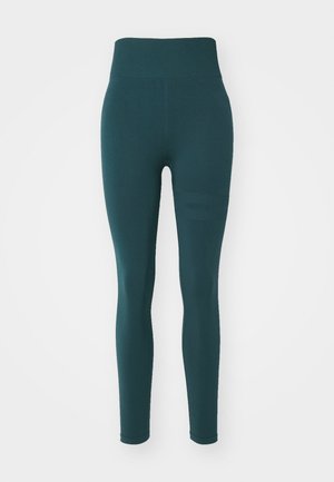 Tirkīza krāsas augstās legiņas, kas izgatavotas no elastīga materiāla, ar gludu tekstūru un smalku svītru dizainu sānos.