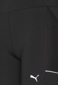 Puma RUN FAVORITE SHORT - Retuusid - black