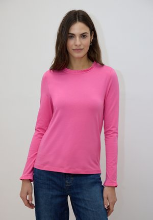 - Bluzka z długim rękawem