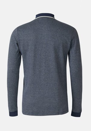 Chemise à manches longues gris foncé avec col et poignets bleu marine, vue de dos sur un fond uni.