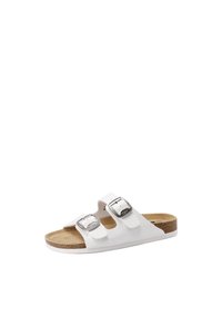 Sandal a slip-on bianca con due fibbie argentate regolabili, suola in sughero e superficie superiore texturizzata. Design piatto con suola imbottita.