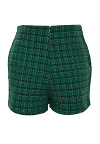 Groene high-waist shorts van tweed met een subtiel zwart en goud geblokt patroon en een ritssluiting aan de achterkant.