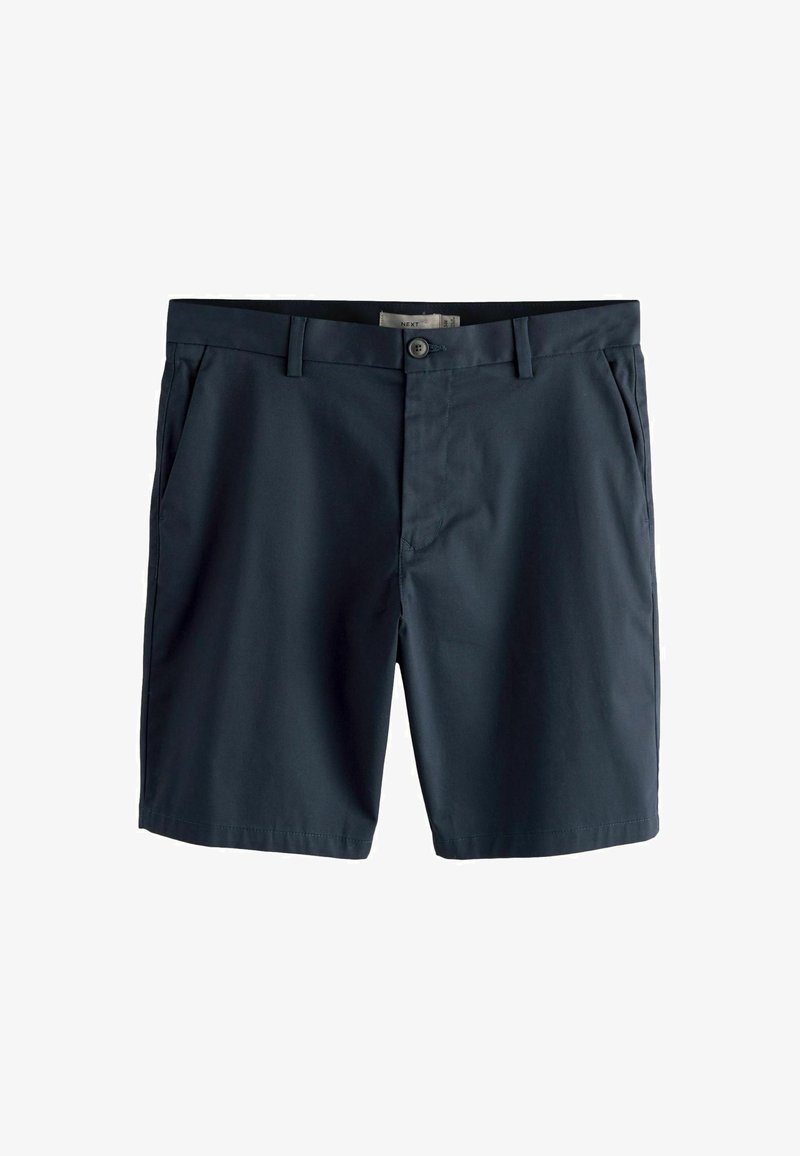 Shorts bleu marine foncé sur mesure avec passants pour ceinture, fermeture à bouton, poches latérales et braguette zippée cachée.