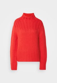 Roter gestrickter Pullover mit hohem Rollkragen und geripptem Struktur, der einen figurbetonten Oberkörper sowie einen breiten gerippten Saum und Ärmelbündchen hat.