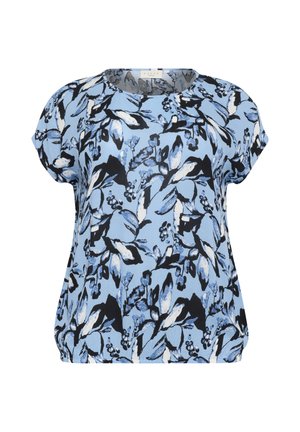 Short-sleeve top in light blue fabric featuring a floral pattern in black and white, round neckline, and relaxed fit. Soft texture.