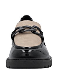 Black patent leather shoes featuring a beige suede upper and decorative black chain detail. Textured sole for grip.