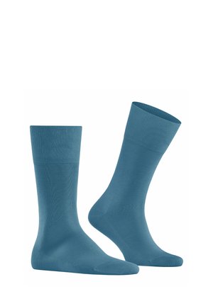 Helle blaue Socken aus glattem, elastischem Stoff, mit einem gerippten Bündchen und nahtloser Zehenpartie für zusätzlichen Komfort. Zwei Socken abgebildet.