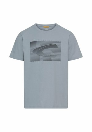 Jasnoniebieska bawełniana koszulka z krótkim rękawem, z czarnym, geometrycznym wzorem graficznym na środku. Czysty i prosty krój.