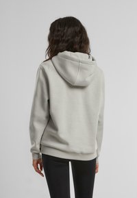 Merchcode MINNIE MOUSE MOOD FLUFFY HOODY - Hoodie - lightasphalt