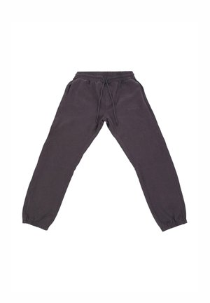 Graue Jogginghosen aus weichem Stoff, mit elastischem Taillenbund, verstellbarem Kordelzug und gerippten Bünden an den Knöcheln.