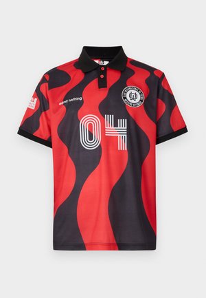 Red and black polo shirt featuring wave patterns, a black collar, a circular logo, and the number "04" in white and striped design.