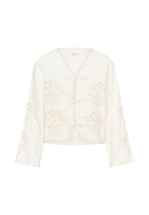 Weiße langärmlige, kurze Bluse mit wellenförmigen Kanten, floralen Spitzenausschnitten und drei vorderen Binderverschlüssen.