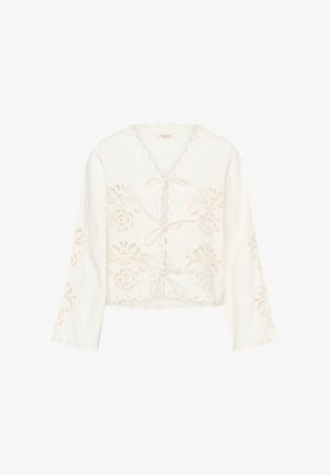 Valge pika varrukaga kõhukani jakk sikk-sak servade, lillelise pitsi lõigetega ja kolme ees oleva nööbitsusega.