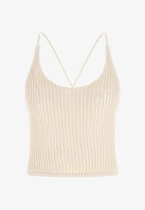 Crop top beige en tricot avec fines bretelles spaghetti formant un V dans le dos et un décolleté arrondi.