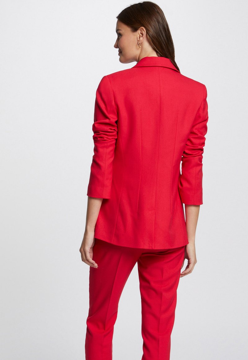 Mules cuir fourrées pour femme | Claudie Pierlot Mules cuir fourrées pour femme | Claudie Pierlot