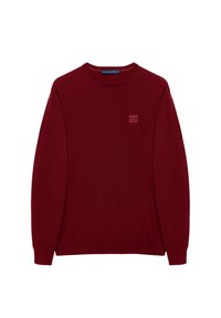 Czerwony sweter wykonany z dzianiny, z okrągłym dekoltem i długimi rękawami. Zawiera małą, tonową metkę z logo na lewej piersi.