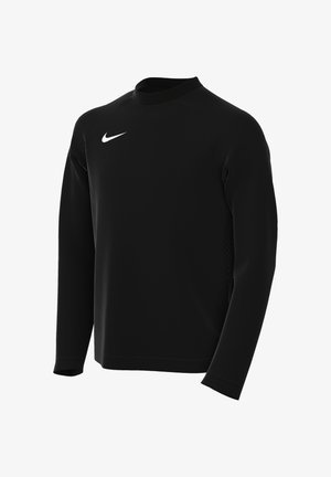 Camiseta deportiva negra de manga larga con cuello redondo y logo blanco de Nike en el pecho izquierdo, mostrada sobre un fondo blanco sencillo.