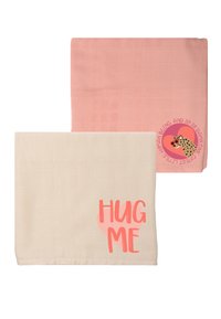 Two soft blankets: one light pink with a grid pattern, the other cream with a large "HUG ME" graphic in coral.