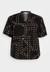 Svart kortärmad blus med geometriskt mönster i beige. Strukturerad design med V-ringning och avslappnad passform. Mjuk tygtextur.