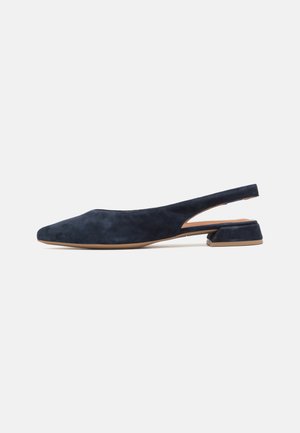 Navy blue suede slingback shoe with pointed toe and a low, angled heel. Features a slip-on design and smooth texture.