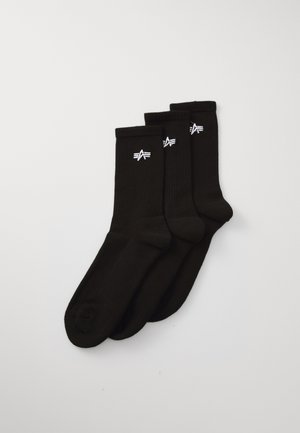 Black cotton socks, ribbed texture, three pairs, featuring a small white logo on the side, smooth finish, and crew length design.