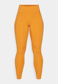UNIVERSA SEAMLESS FRONT - Legingi - monarch legend caramel rugged orange