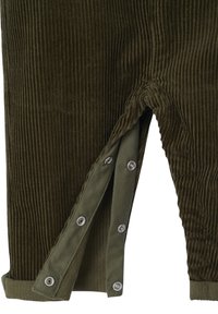 Green corduroy pants with a ribbed texture. Features snaps along the side and a folded cuff. Accent material in a solid olive green.