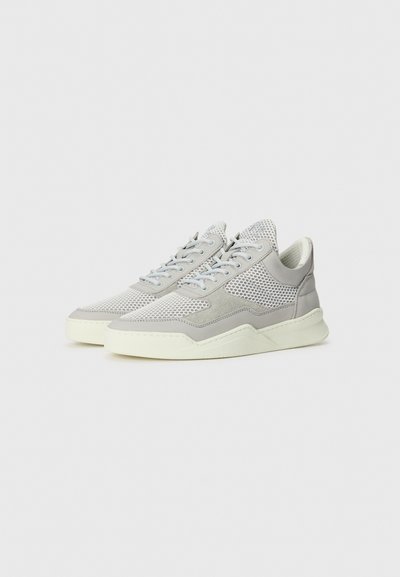 Light gray sneakers with mesh panels, suede accents, flat laces, and a textured sole; rounded toe and contrasting white midsole.