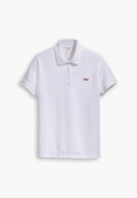 Polo blanc à manches courtes avec col et trois boutons, avec un petit logo rouge Levi's sur la poitrine gauche.