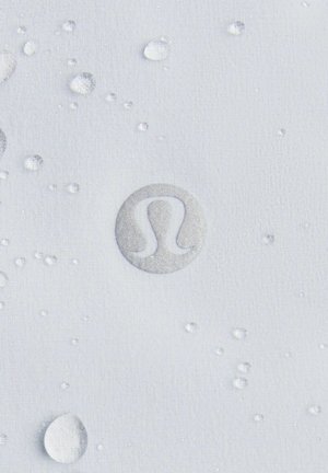 Water-resistant fabric in light gray featuring silver logo and small water droplets. Textured surface with smooth, matte finish.