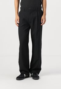 Jack & Jones JPSTBILL JJDAYTONA WIDE - Trousers - black